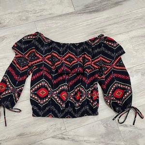 Multi color short top, can be worn off the shoulder. Elastic at the bottom